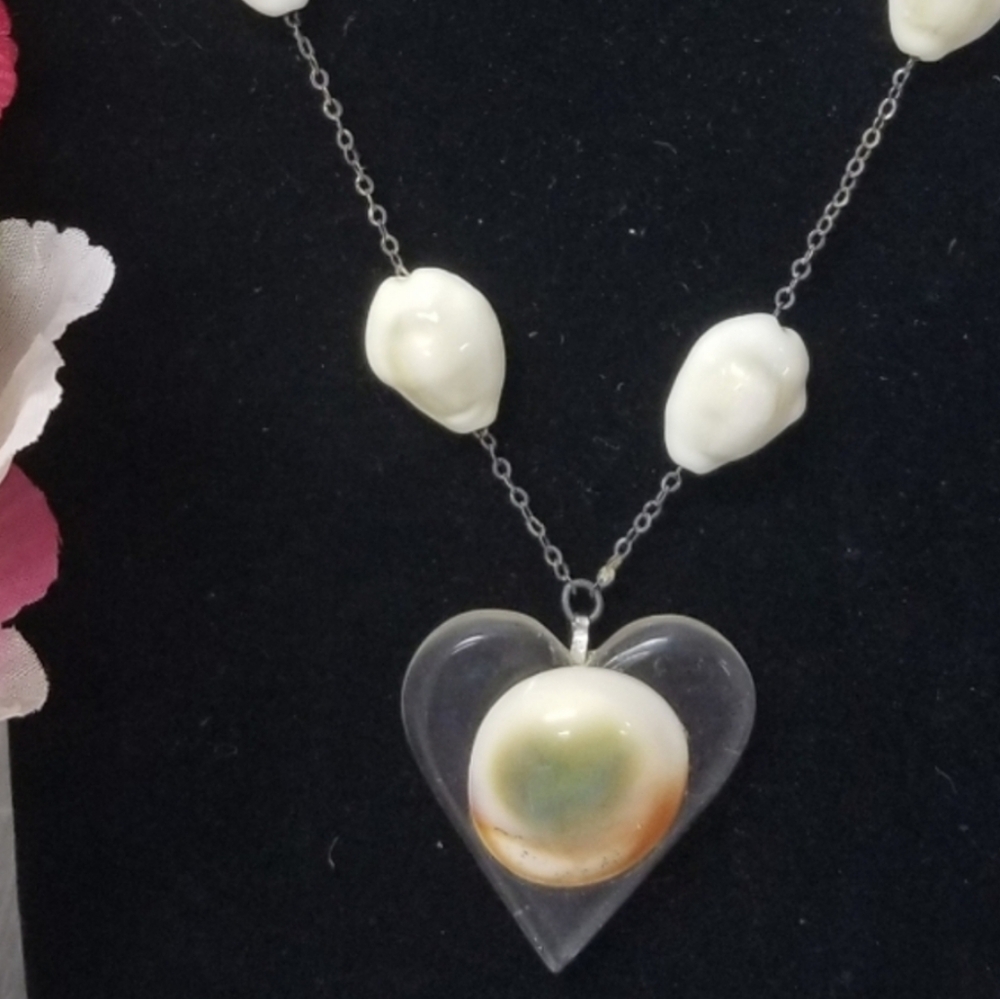 Vintage cowrie shell / sterling silver necklace